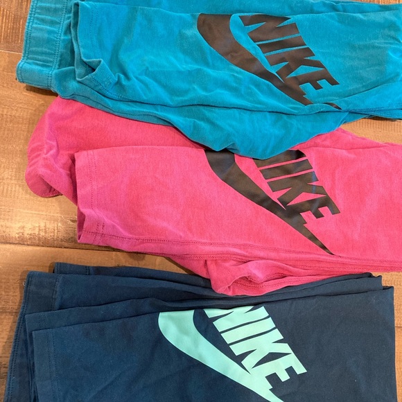 3 pairs of size medium ankle length Nike leggings - Picture 1 of 1